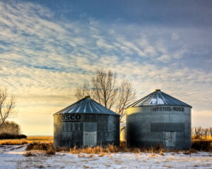Grain Bins at Sunset