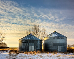 Grain Bins at Sunset
